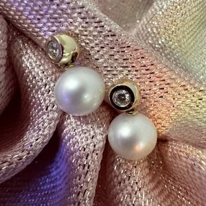 Pearl and diamond earrings from Saks.